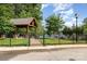 A gazebo and seating area overlooking the water with wrought iron fencing at 138 Lanyard Dr # B, Mooresville, NC 28117
