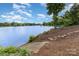 Beautiful lake view from the property with steps to the water's edge at 138 Lanyard Dr # B, Mooresville, NC 28117