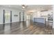 Bright living room featuring modern flooring, recessed lighting, and a contemporary open-concept design at 138 Lanyard Dr # B, Mooresville, NC 28117