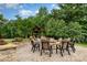 Outdoor lounge area with a gazebo, stone patio, and seating around a fire pit at 138 Lanyard Dr # B, Mooresville, NC 28117