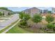 Waterfront at Langtree community sign with lush landscaping, providing an inviting neighborhood entrance at 138 Lanyard Dr # B, Mooresville, NC 28117