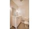 Bright bathroom features a classic white vanity, neutral tile flooring, and modern fixtures at 1503 Brentwood Dr, Newton, NC 28658