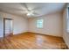 Neutral bedroom with hardwood floors and a ceiling fan at 1503 Brentwood Dr, Newton, NC 28658