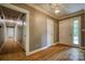 Foyer with shiny hardwood floors and an ornate ceiling light fixture at 1503 Brentwood Dr, Newton, NC 28658