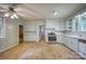 Vintage-style kitchen featuring white cabinets and stainless steel appliances at 1503 Brentwood Dr, Newton, NC 28658
