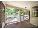 Screened-in porch with brick floor, exposed brick, and view of the backyard at 1503 Brentwood Dr, Newton, NC 28658