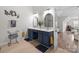 Bathroom featuring double sinks, a stylish vanity, and plenty of natural light at 1572 Edenton Nw St, Concord, NC 28027