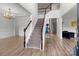 Elegant foyer features a staircase, hardwood floors, and ample natural light at 1572 Edenton Nw St, Concord, NC 28027
