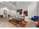 Bright living room features high ceilings, wood floors, and an open layout perfect for modern living at 1572 Edenton Nw St, Concord, NC 28027