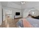 Open main bedroom suite with a seating area, ensuite bathroom, and walk-in closet at 1572 Edenton Nw St, Concord, NC 28027