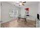 Bright home office with a large window, modern desk, and ample space for productivity at 1572 Edenton Nw St, Concord, NC 28027