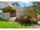 Backyard features a wooden deck and partial privacy wall offering an outdoor space to relax and entertain at 1705 Townsend Ln, Rock Hill, SC 29730