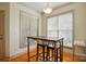 Eat-in dining area features a modern table set with natural light from large windows at 1705 Townsend Ln, Rock Hill, SC 29730