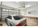 Clean and organized garage with shelving, overhead lighting, and a parked Lexus sedan at 1705 Townsend Ln, Rock Hill, SC 29730