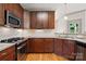 Well-equipped kitchen with stainless steel appliances, granite countertops, and ample cabinet space at 1705 Townsend Ln, Rock Hill, SC 29730