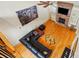 Bright living room with stone fireplace, hardwood floors, and large sectional sofa at 1705 Townsend Ln, Rock Hill, SC 29730