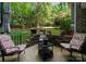 Charming backyard seating area with a patio, chairs, and garden, perfect for relaxing and entertaining at 171 Secretariat Dr, Mooresville, NC 28117
