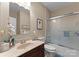 Cozy bathroom with marble countertop, framed mirror, updated lighting, and a shower with glass doors at 171 Secretariat Dr, Mooresville, NC 28117