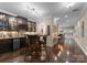 Elegant dining area with a bar, high-top table, custom cabinets, and plenty of space for entertaining guests at 171 Secretariat Dr, Mooresville, NC 28117