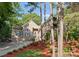 Charming home nestled among mature trees and featuring a spacious driveway and a balcony at 171 Secretariat Dr, Mooresville, NC 28117