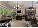 Bright breakfast area and bar seating offer a place for casual dining and lead to modern kitchen appliances at 171 Secretariat Dr, Mooresville, NC 28117