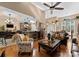 Spacious living room featuring hardwood floors, a ceiling fan, and an open concept layout at 171 Secretariat Dr, Mooresville, NC 28117