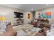 Inviting living room with a comfortable sofa, recliner, a coffee table, and a TV for relaxation and entertainment at 171 Secretariat Dr, Mooresville, NC 28117