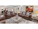 Comfortable living room features plush sofas, decorative pillows, a coffee table, and recessed lighting at 171 Secretariat Dr, Mooresville, NC 28117