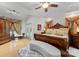 Elegant main bedroom featuring a decorative bed, bench, ensuite bathroom, and a walk-in closet at 171 Secretariat Dr, Mooresville, NC 28117