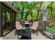 This outdoor patio has a grill, and cozy seating nestled within a lush green environment, ideal for relaxing at 171 Secretariat Dr, Mooresville, NC 28117