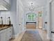 This bathroom features dual vanities, a large soaking tub, and a glass-enclosed shower at 18718 Peninsula Cove Ln, Cornelius, NC 28031