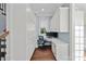 This office has floor to ceiling storage, a desk and an office chair at 18718 Peninsula Cove Ln, Cornelius, NC 28031