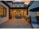 Spacious outdoor patio featuring a dining area, grill, and comfortable seating at 18718 Peninsula Cove Ln, Cornelius, NC 28031