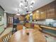 Spacious kitchen with breakfast nook, wooden cabinets, and granite countertops at 2223 Jon Chris Dr, Harrisburg, NC 28075