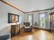 Comfortable living room with hardwood floors, natural light, and elegant decor featuring a stylish picture frame at 2223 Jon Chris Dr, Harrisburg, NC 28075