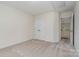 Neutral bedroom features carpet and closet, offering a serene and comfortable living space at 2504 Korbel Ct, Waxhaw, NC 28173