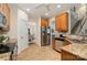 Spacious kitchen boasting stainless steel appliances, granite counters, and an open layout with adjacent dining area at 2504 Korbel Ct, Waxhaw, NC 28173