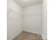 The empty closet features wire shelving and neutral carpeting at 2515 Walnut Forest Dr, Charlotte, NC 28216
