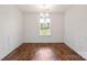 Bright dining room features hardwood floors, crown molding, and a modern light fixture at 2515 Walnut Forest Dr, Charlotte, NC 28216