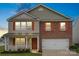 Charming two-story home boasts a brick facade, a covered porch, an attached two-car garage, and well-maintained landscaping at 2515 Walnut Forest Dr, Charlotte, NC 28216