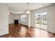 Bright living space with hardwood floors, a fireplace, neutral walls, and sliding doors to the back yard at 2515 Walnut Forest Dr, Charlotte, NC 28216