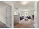 Upstairs living room with neutral carpet and furniture offers space for relaxation and entertainment at 2515 Walnut Forest Dr, Charlotte, NC 28216