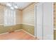 Bright dining room with shuttered windows and classic wallpaper at 2715 Kennetuck Ct, Charlotte, NC 28273
