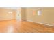 Spacious room featuring hardwood floors and natural light at 2715 Kennetuck Ct, Charlotte, NC 28273