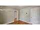 Cozy bedroom with hardwood floors, neutral paint, white trim, and plenty of natural light at 2820 Bellhaven Cir, Charlotte, NC 28214