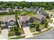 An aerial shot of homes in a subdivision with fenced yards and mature trees at 2835 Berkhamstead Cir, Concord, NC 28027