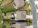 Bird's-eye view of a home showcasing its backyard, patio, and well-defined property lines at 2835 Berkhamstead Cir, Concord, NC 28027