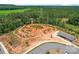 Aerial view of a dirt bike course surrounded by lush green trees and walking paths at 3078 Mountain Creek Dr, Sherrills Ford, NC 28673