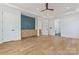 Spacious bedroom with hardwood floors, built-in cabinets, and large doorways at 3078 Mountain Creek Dr, Sherrills Ford, NC 28673