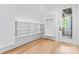 A closet with custom shelving and a hanging rod next to a glass door at 3078 Mountain Creek Dr, Sherrills Ford, NC 28673